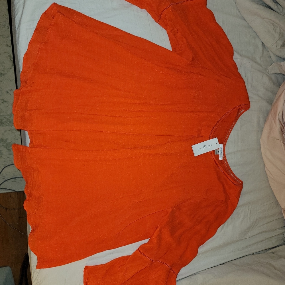 Bright orange gauzy blouse